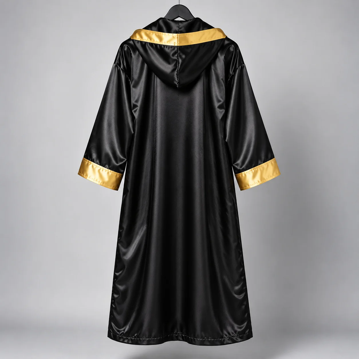 Black and gold boxing robe rear view