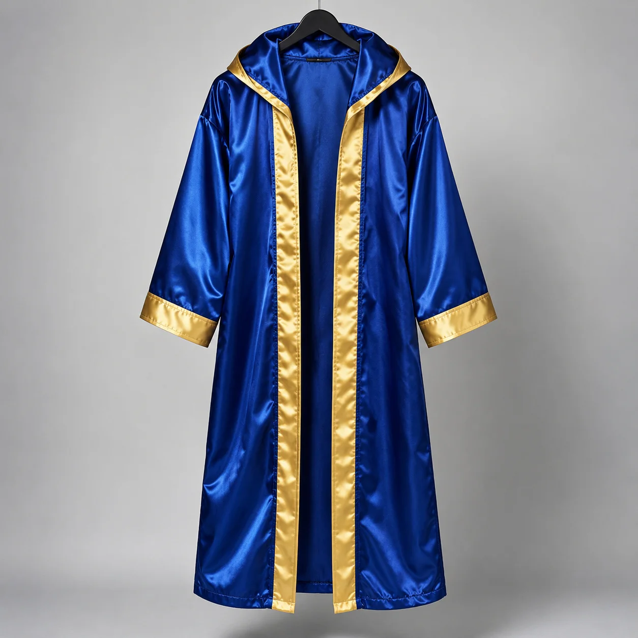 Royal blue and gold boxing robe hanging in studio