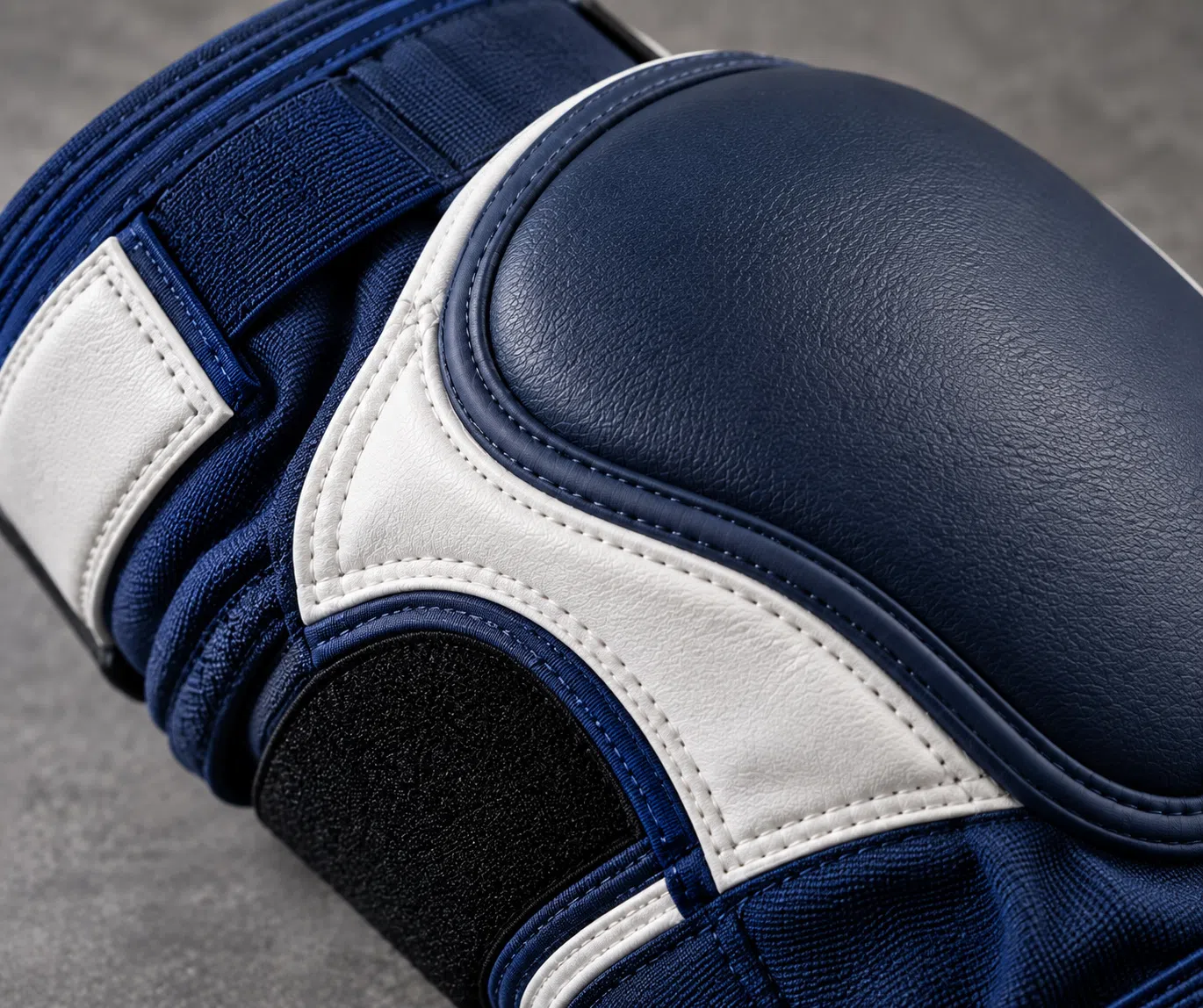 Close-up detail of blue elbow or knee pad construction