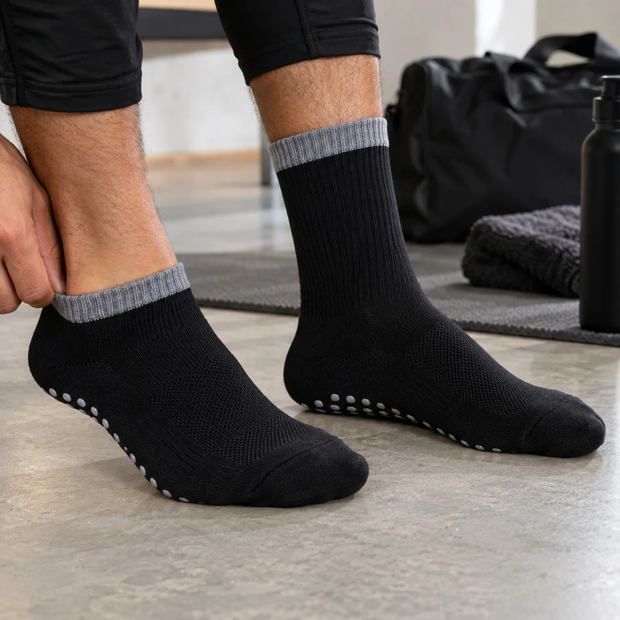 Black grappling grip socks worn during training