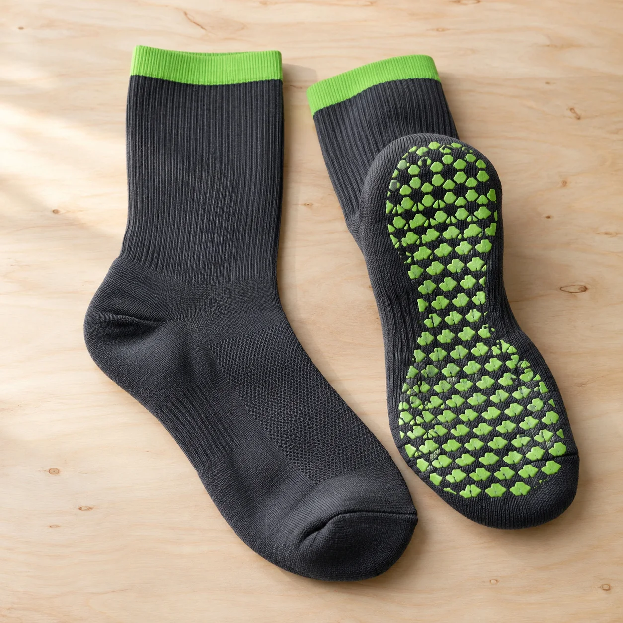 Charcoal grappling grip socks with lime silicone traction sole
