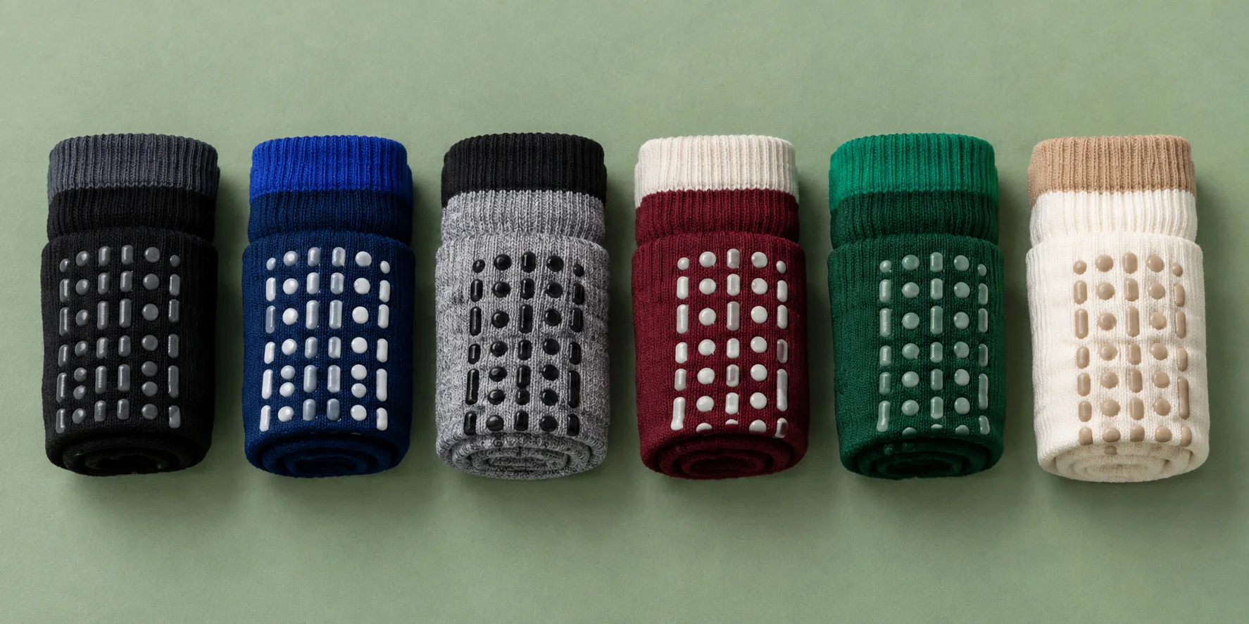 Assorted custom grappling grip socks in multiple colorways
