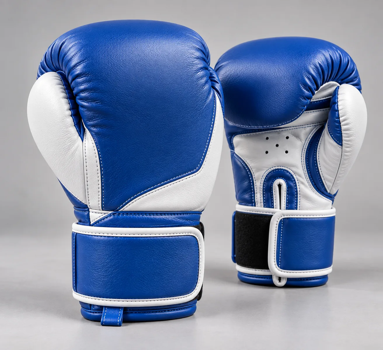 Blue and white junior boxing gloves clean ecommerce product photo